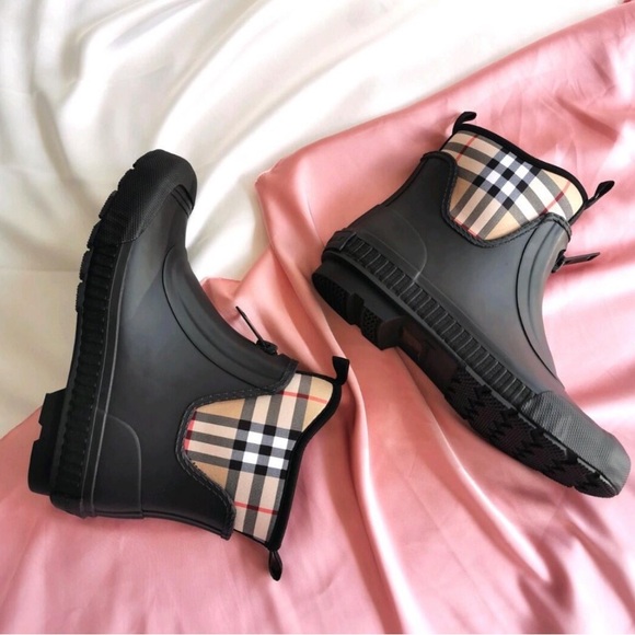 New in box Burberry rain boots with classic check lining